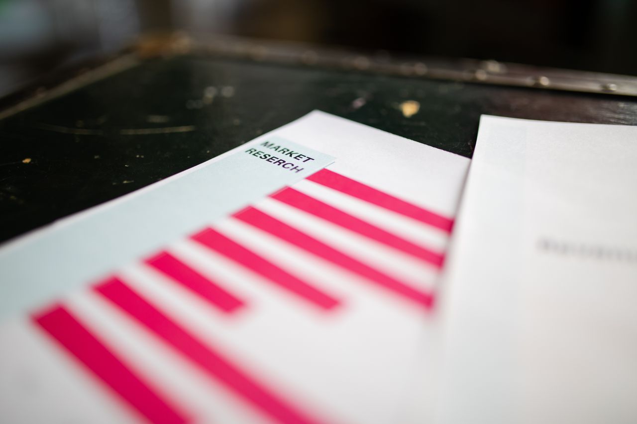 who-we-are A close-up view of a market research report showing a bar chart with an emphasis on market trends.